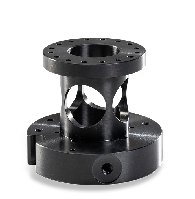 One shiny black machined part.