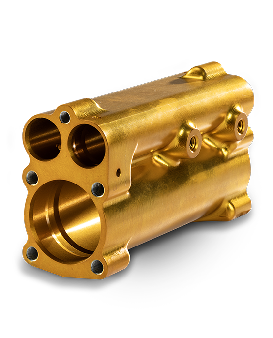 One shiny gold machined part.