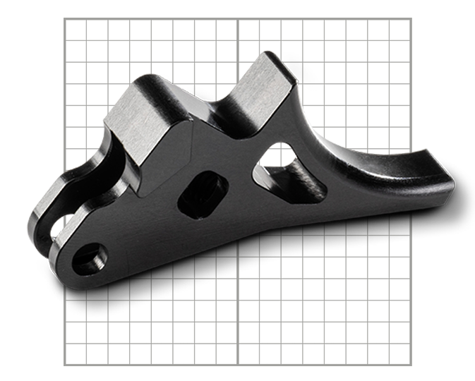 One shiny black machined part.