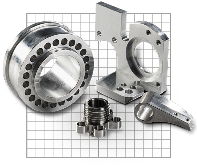 Four shiny silver machined parts.