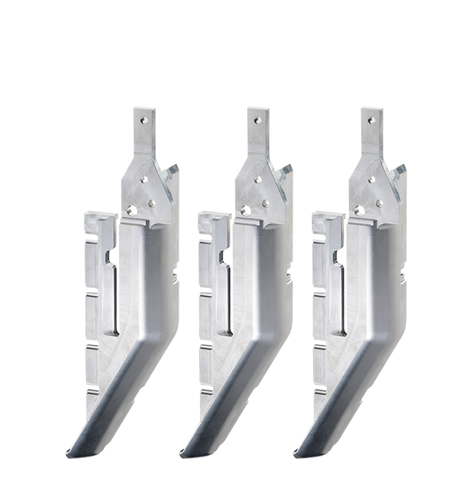 Three shiny silver machined parts.