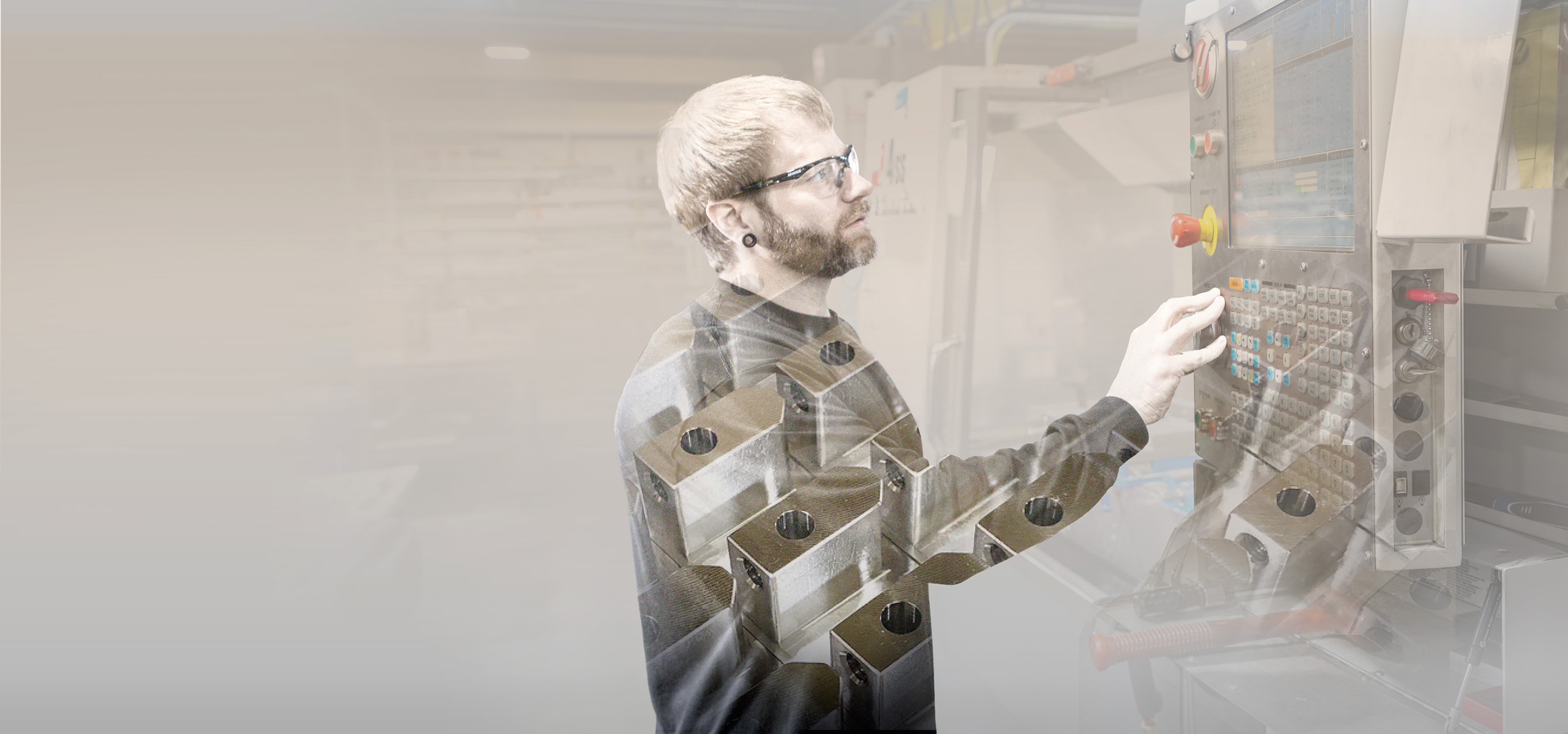 A man looking at a machine control board and pressing a button.